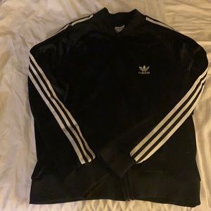 Black adidas XL zipper warm up jacket from 70’s.